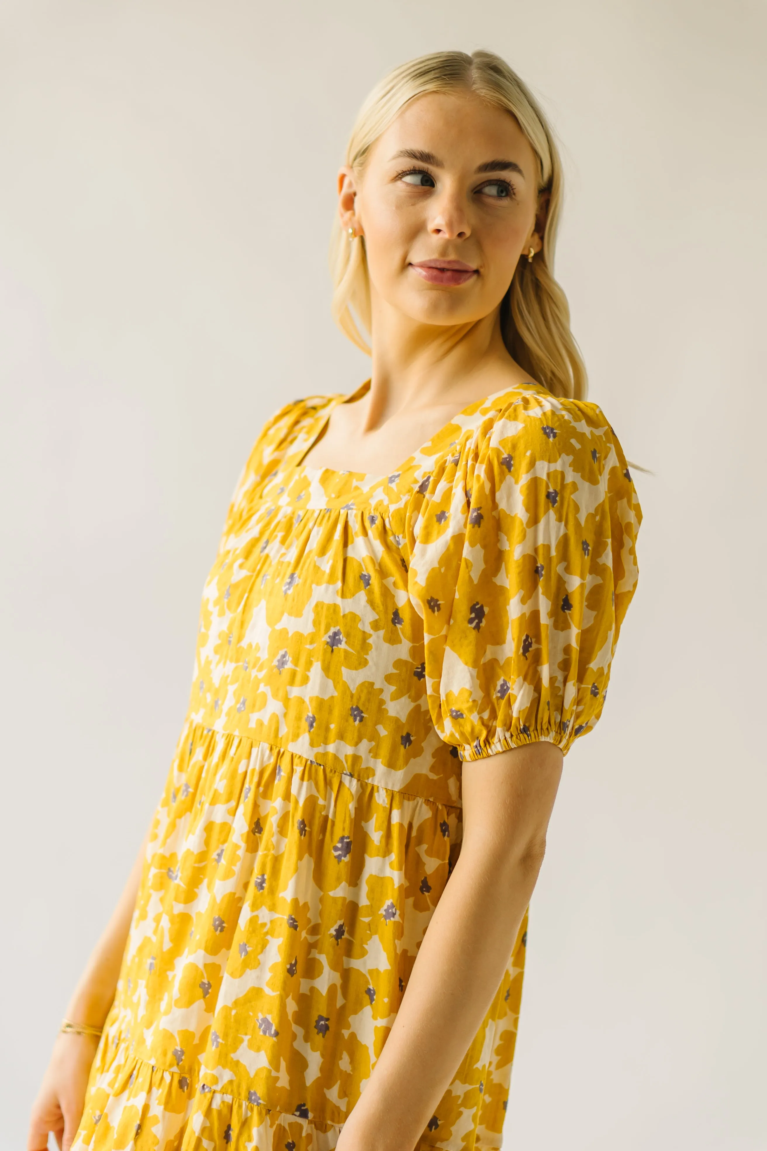 The Burwell Tiered Midi Dress in Mustard Floral